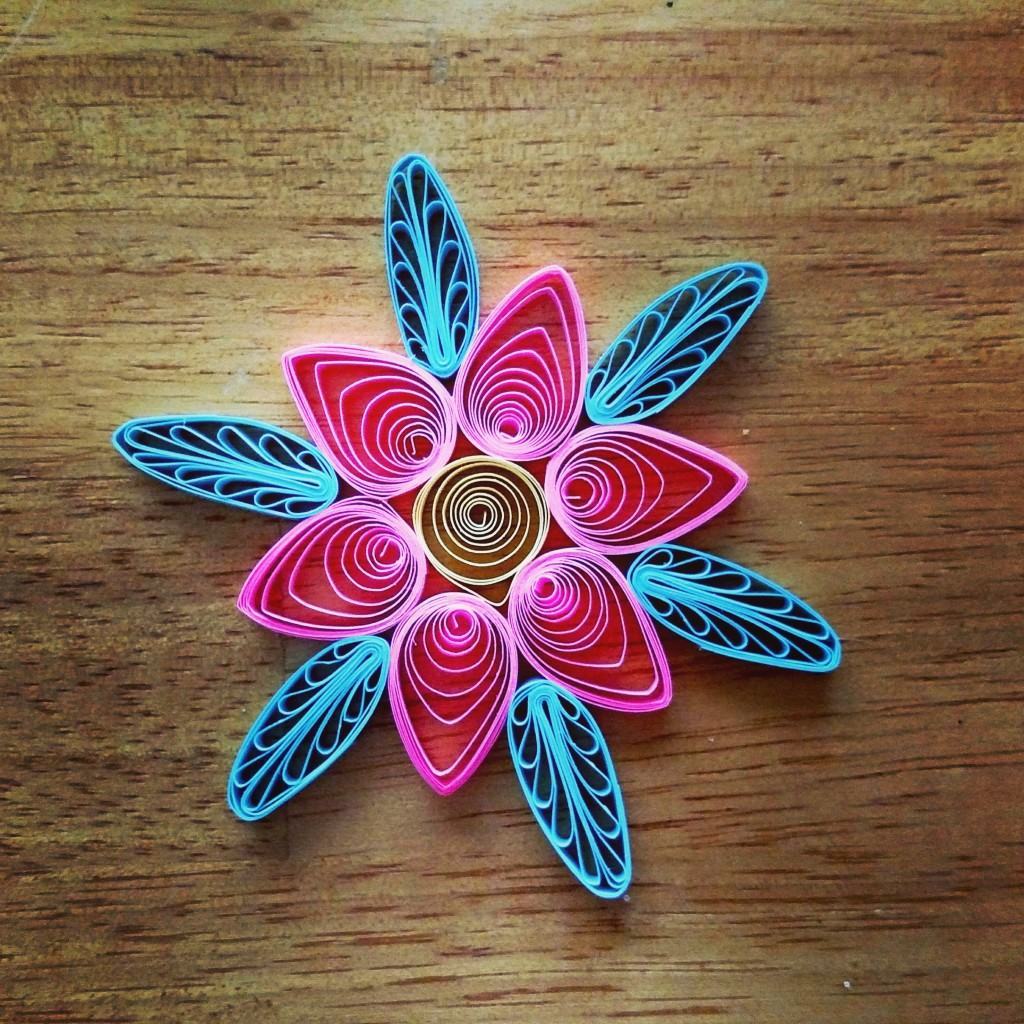 pink and blue quilled flower