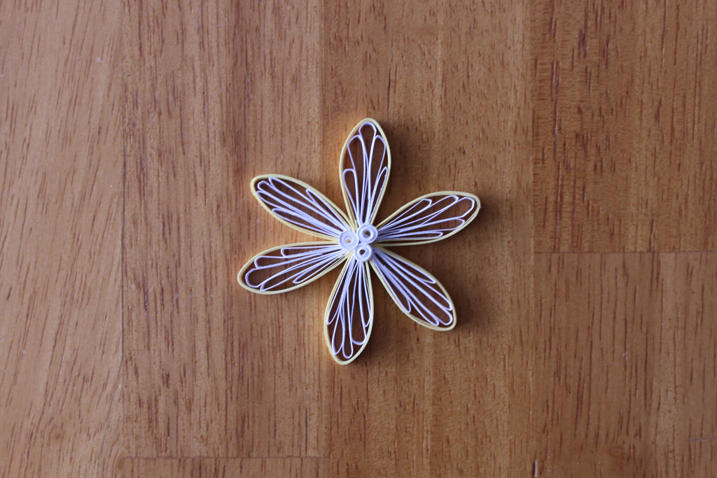 yellow quilling flower