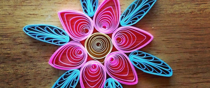 pink and blue quilled flower